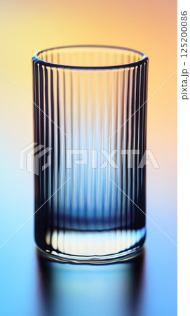 Elegant ribbed glass tumbler with ambient light reflections Elegant ribbed glass tumbler with ambient light reflections 125200086