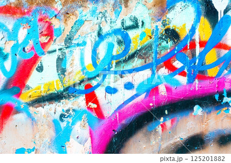 Vibrant Urban Graffiti Art in Neon Blue, Pink, Yellow for Modern 2000s Aesthetic 125201882