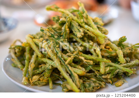 Crispy morning glory salad, Thai food. Commonly eaten with shrimp sauce Crispy morning glory salad, Thai food. Commonly eaten with shrimp sauce 125204400