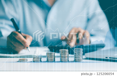 Business finance technology and investment concept, Business people analyze financial data chart trading forex, investing in stock markets, funds and digital assets, Business finance background. Business finance technology and investment concept, Business people analyze financial data chart trading forex, investing in stock markets, funds and digital assets, Business finance background. 125206054