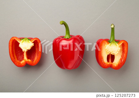 Red sweet pepper on grey background. Space for text. Flat lay Red sweet pepper on grey background. Space for text. Flat lay 125207273