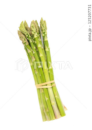 Fresh green asparagus on a white background Fresh green asparagus on a white background 125207731