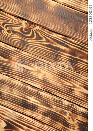 Brown wood plank wall texture background. Vertical photo Brown wood plank wall texture background. Vertical photo 125208195