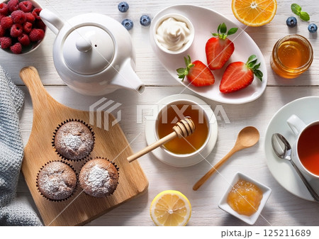 楽しそうなティータイムのテーブル 125211689