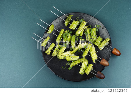 Healthy diet eating, celery on skewers. 125212545