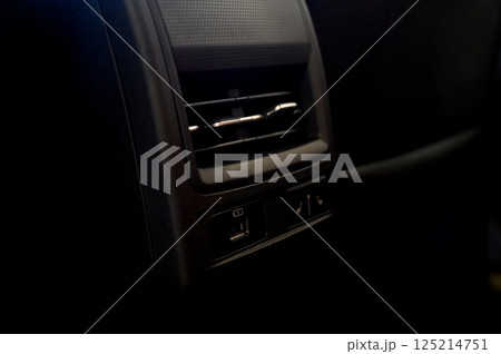 Car air conditioner close-up. Air conditioner flow inside the car. Car air conditioner close-up. Air conditioner flow inside the car. 125214751