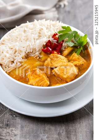 Massaman curry isolated on white background. Traditional Thai food recipe 125215945