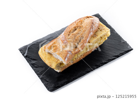 Spanish potato omelette sandwich isolated on white background Spanish potato omelette sandwich isolated on white background 125215955