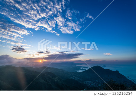 Mystical Twilight: Dancing Clouds Between Mountain and Sea in Ruifang. Mystical Twilight: Dancing Clouds Between Mountain and Sea in Ruifang. 125216254