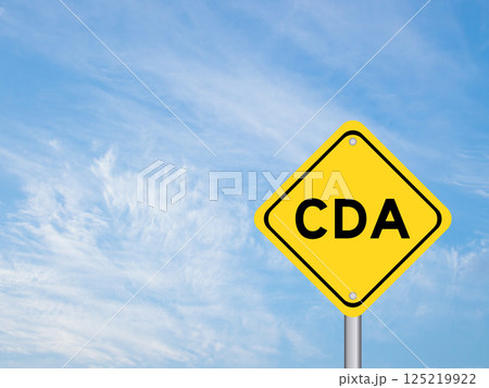 Yellow transportation sign with word CDA (Abbreviation of Confidential disclosure agreement) on blue color sky background Yellow transportation sign with word CDA (Abbreviation of Confidential disclosure agreement) on blue color sky background 125219922