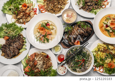 assortment of mixed traditional vietnamese food dishes on buffet table 125220183