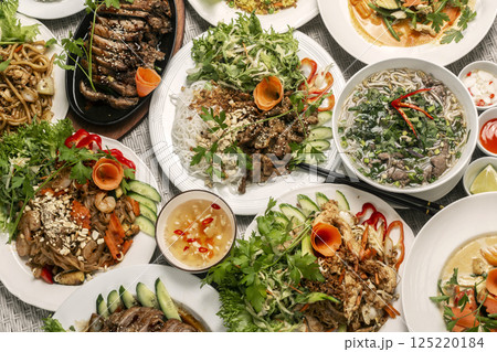 assortment of mixed traditional vietnamese food dishes on buffet table 125220184