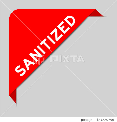 Red color of corner label banner with word sanitized on gray background 125220796