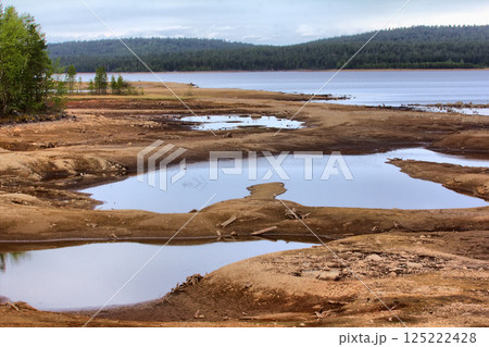 Discharge of water from hydropower, river bottom was exposed 125222428