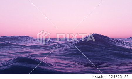 ピンク色の夕焼けに染まる静かな海の波紋 ピンク色の夕焼けに染まる静かな海の波紋 125223185