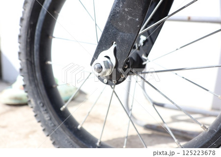 A CloseUp View of a Bicycle Wheel Hub and Its Spokes, Capturing Every Detail Clearly 125223678