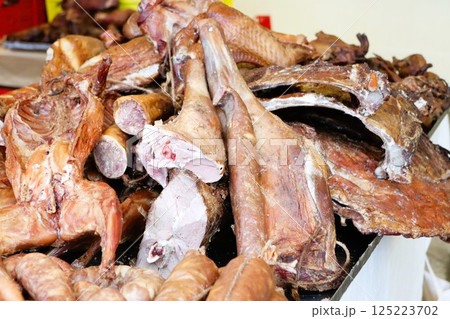 A Wide Array of Dried and Cured Meats Beautifully Displayed in the Local Market Setting 125223702