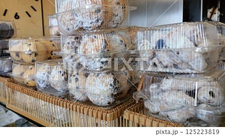 A Variety of Assorted Packaged Cookies beautifully Displayed in a Cozy Cafe Bakery A Variety of Assorted Packaged Cookies beautifully Displayed in a Cozy Cafe Bakery 125223819