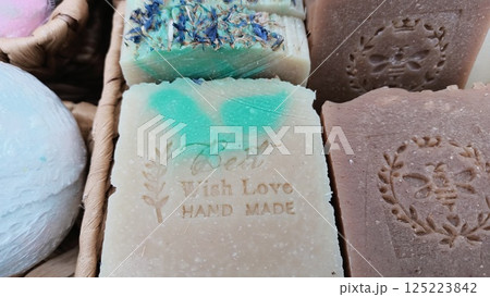 Handmade artisan soap bars with natural ingredients, captivating scents, and beautiful designs Handmade artisan soap bars with natural ingredients, captivating scents, and beautiful designs 125223842