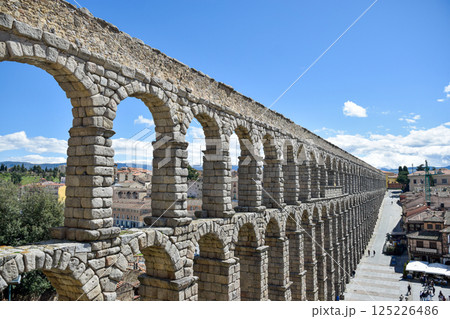 Right upper side view of Segovia Aqueduct with square, Roman construction Right upper side view of Segovia Aqueduct with square, Roman construction 125226486