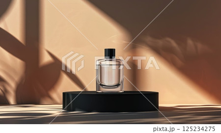 A bottle of cologne is sitting on a black pedestal A bottle of cologne is sitting on a black pedestal 125234275
