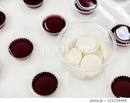 Bread and grape juice prepared for the Holy Communion 125238468