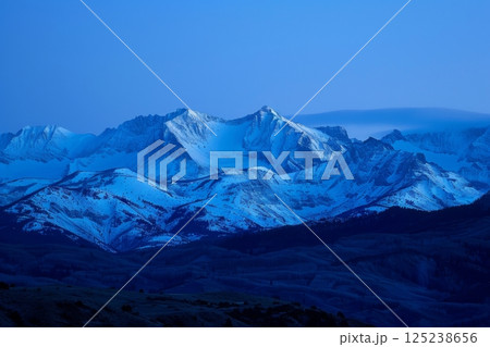 Snow-Covered Mountain Range at Twilight Snow-Covered Mountain Range at Twilight 125238656