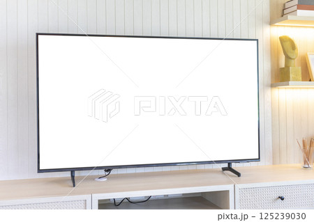 Comfortable room with modern LED TV and wooden CABINET. 125239030