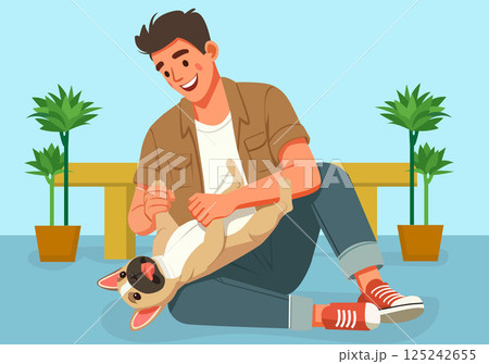 A young man is wrestling with his favorite French bulldog. A young man is wrestling with his favorite French bulldog. 125242655