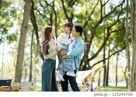 Happy asian family picnic in park, weekend lifestyle outdoors. Happy asian family picnic in park, weekend lifestyle outdoors. 125244708
