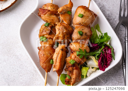 Chicken skewers kebab with vegetables 125247098