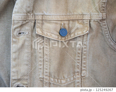 Close-up of a denim fabric pocket and button. High quality photo 125249267