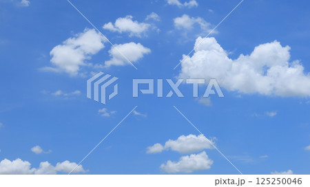 White clouds on blue sky background White clouds on blue sky background 125250046