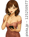 ピンクのドレス姿でリップメイクをしている女性 125250977
