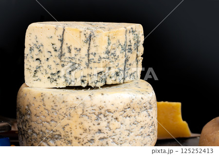 Blue cheese chunks on display at farmers market 125252413