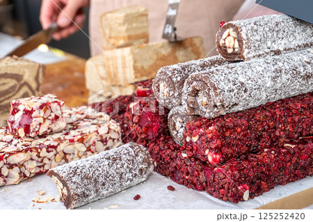 Handmade nut and fruit sweets at farmers market Handmade nut and fruit sweets at farmers market 125252420