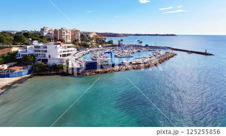 Aerial stunning coastal view of Dehesa de Campoamor on Costa Blanca 125255856