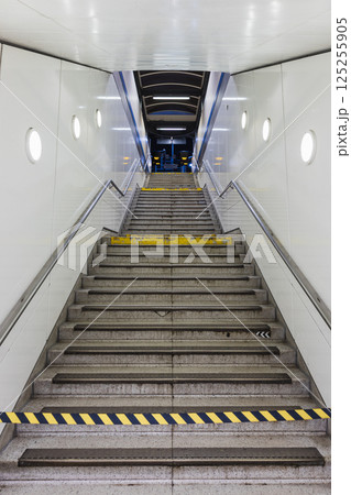 Staircase Leading Down to Subway Station with Safety Markings 125255905