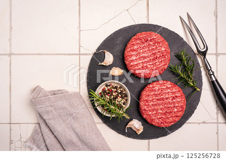 Raw steak burgers Raw steak burgers 125256728