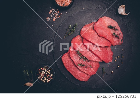 Raw sliced beef or lamb tenderloin meat 125256733