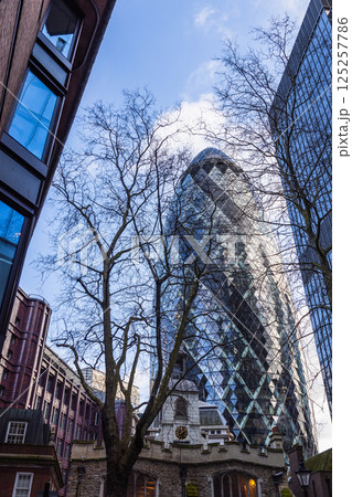 The Gherkin Building in London Surrounded by Urban Architecture The Gherkin Building in London Surrounded by Urban Architecture 125257786