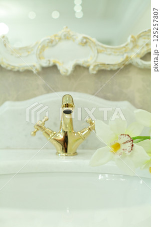 White bathroom sink with mirror 125257807