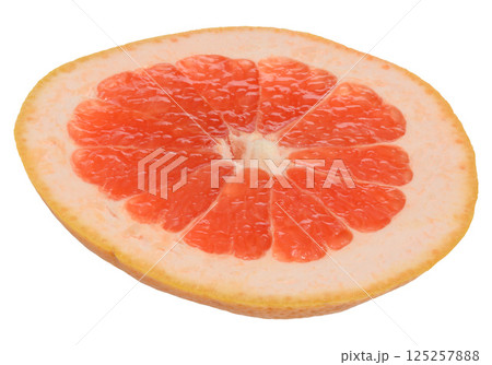 A slice of ripe grapefruit on an isolated background 125257888