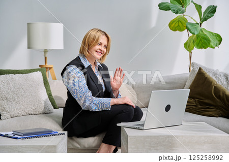 Female psychologist having online session, using laptop Female psychologist having online session, using laptop 125258992