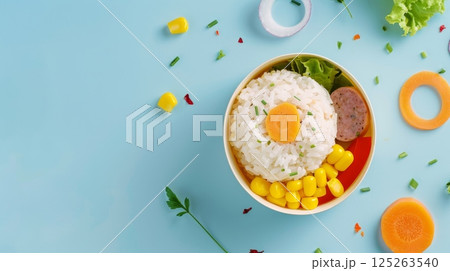 Lunch box rice with carrot, corn, sausage slice for school or work copy space 125263540