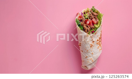 Flat lay shawarma beef baked wrapped with bread copy space isolated background 125263574