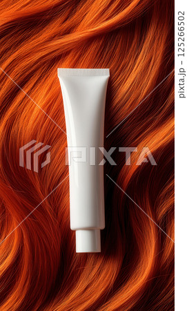 Ai generated White shampoo or hair dye tube lying on long red hair 125266502
