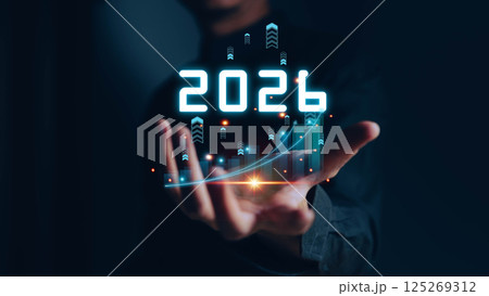 Businessman analyzing 2025 profit growth performance for the 2025-2026 financial plan. Image depicts market concepts, finance trends, revenue graphs, money, and profitability analysis for future 125269312