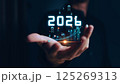Businessman analyzing 2025 profit growth performance for the 2025-2026 financial plan. Image depicts market concepts, finance trends, revenue graphs, money, and profitability analysis for future 125269313