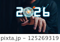 Businessman analyzing 2025 profit growth performance for the 2025-2026 financial plan. Image depicts market concepts, finance trends, revenue graphs, money, and profitability analysis for future 125269319